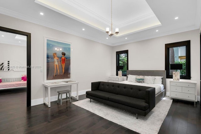 bedroom featuring an inviting chandelier, a tray ceiling, ornamental molding, and dark hardwood / wood-style floors