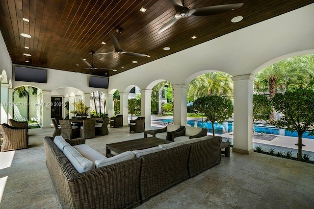 view of patio featuring ceiling fan and an outdoor hangout area