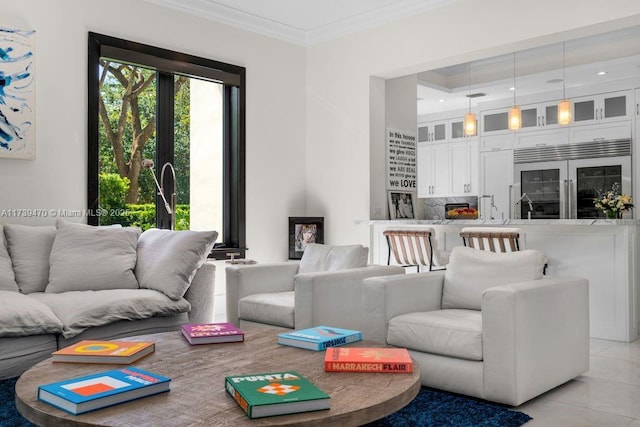 tiled living room featuring ornamental molding