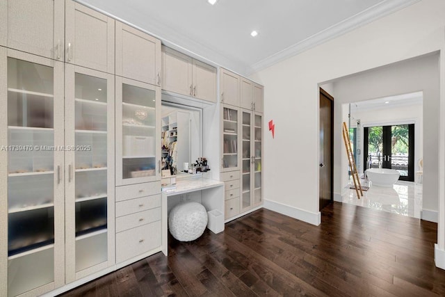 office area with ornamental molding, dark wood-type flooring, and french doors