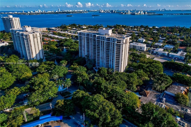 aerial view featuring a water view and a view of city