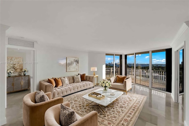 living room featuring a wall of windows