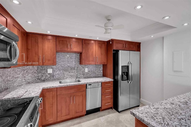 2000 Towerside Ter Unit 910, Miami, FL 33138 - kitchen with appliances with stainless steel finishes, a sink, ceiling fan, decorative backsplash, and recessed lighting