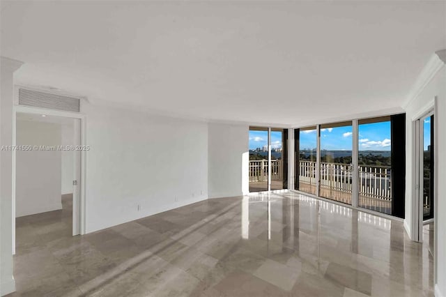 2000 Towerside Ter Unit 910, Miami, FL 33138 - spare room with floor to ceiling windows and crown molding