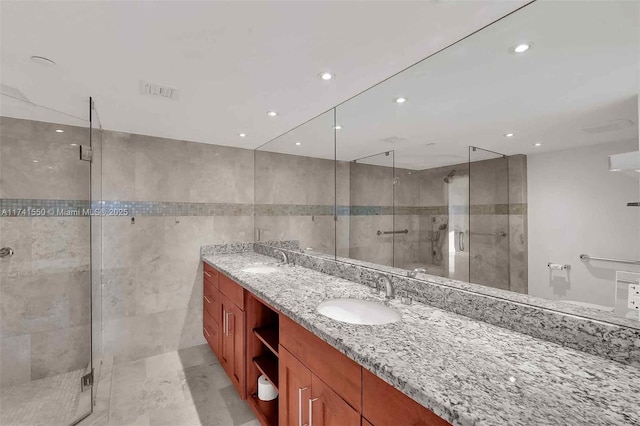 2000 Towerside Ter Unit 910, Miami, FL 33138 - full bathroom with a shower stall, double vanity, and recessed lighting