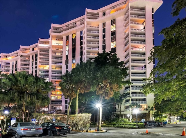 2000 Towerside Ter Unit 910, Miami, FL 33138 - property at night featuring a view of apartment building / complex
