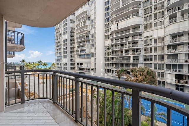 balcony featuring a water view