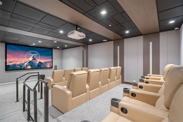 home theater with light colored carpet