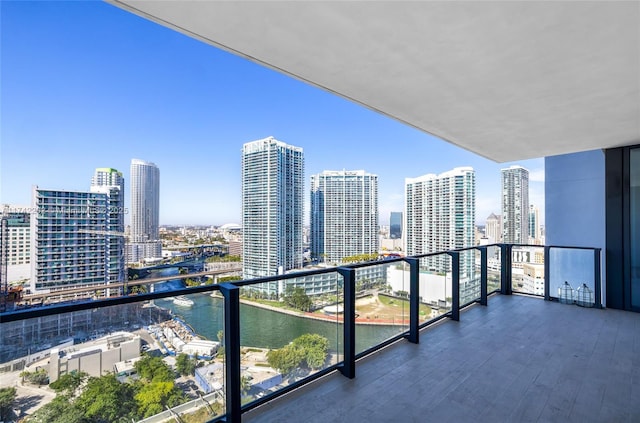 balcony featuring a water view