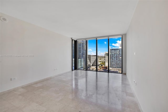 empty room with expansive windows