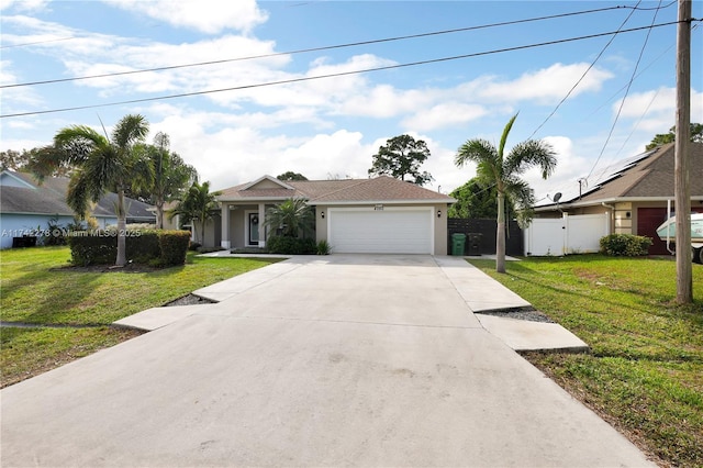 single story home with a garage and a front yard