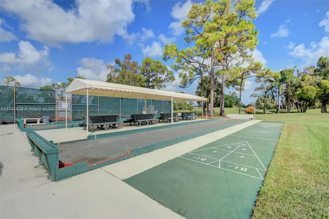 view of home's community featuring a lawn