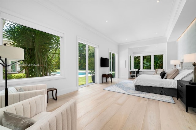 5501 Snapper Creek Rd, Coral Gables, FL 33156 - bedroom featuring access to exterior, multiple windows, and light wood-type flooring