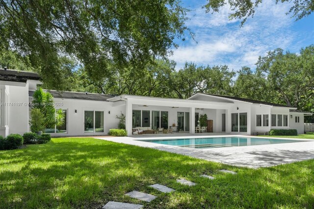 5501 Snapper Creek Rd, Coral Gables, FL 33156 - pool at twilight featuring ceiling fan, french doors, an outdoor pool, and a patio area