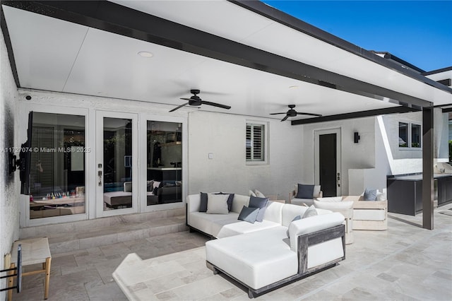 view of patio featuring french doors, ceiling fan, and an outdoor living space