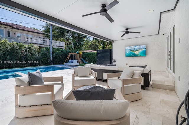 view of patio featuring a fenced in pool, ceiling fan, an outdoor hangout area, fence, and a playground