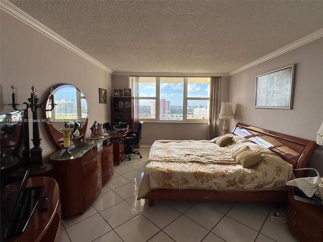 tiled bedroom featuring ornamental molding and a textured ceiling