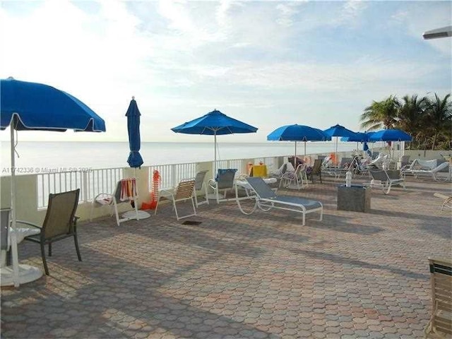 view of patio / terrace featuring a water view