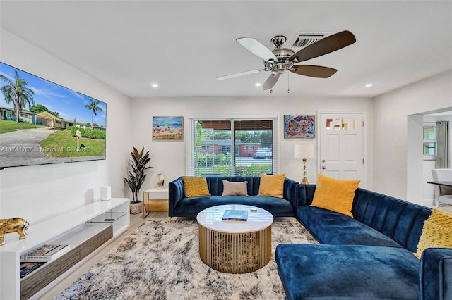 living room with ceiling fan