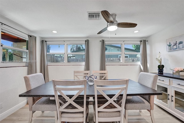 dining room featuring ceiling fan and light hardwood / wood-style flooring