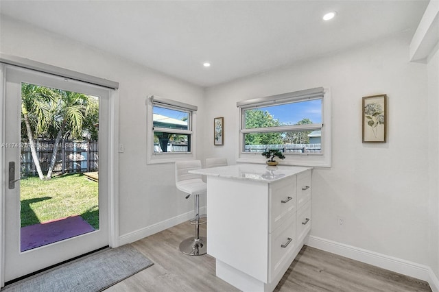 entryway with light hardwood / wood-style flooring