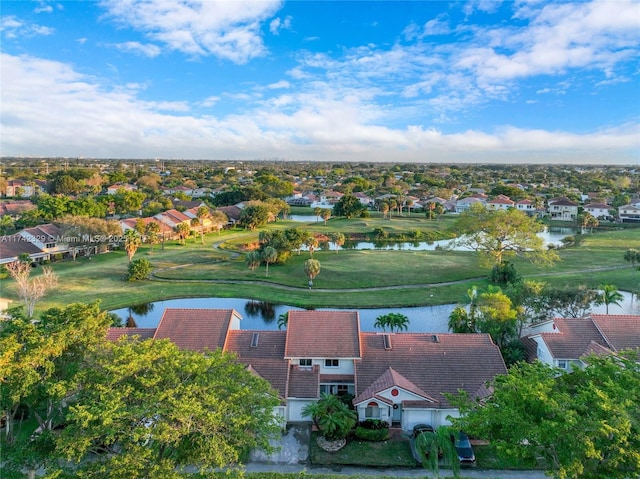 bird's eye view with a water view