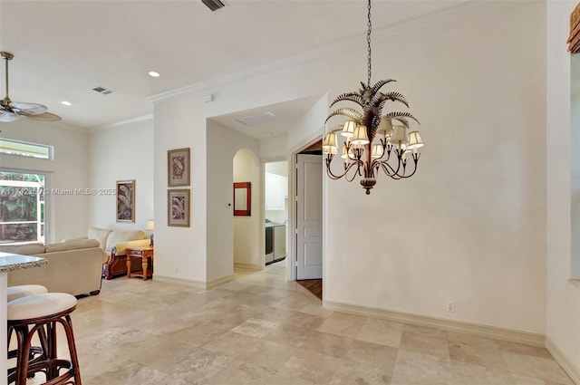 dining area with visible vents, arched walkways, baseboards, ornamental molding, and ceiling fan with notable chandelier