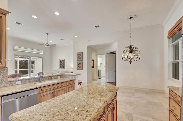 kitchen with a sink, visible vents, open floor plan, stainless steel dishwasher, and crown molding