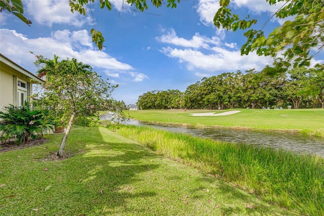 view of yard featuring a water view