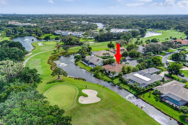 birds eye view of property featuring a water view and golf course view