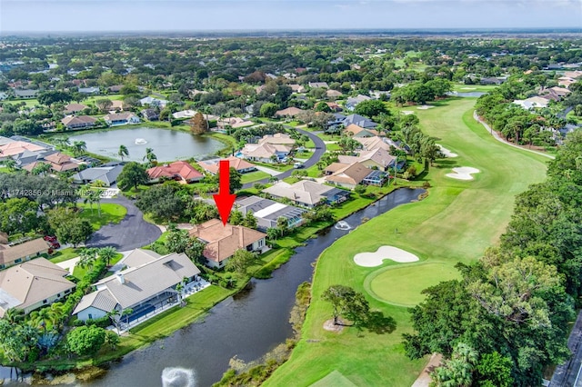 birds eye view of property featuring a residential view and golf course view