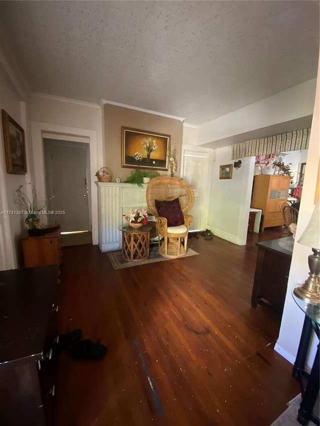 hall featuring crown molding and dark hardwood / wood-style flooring