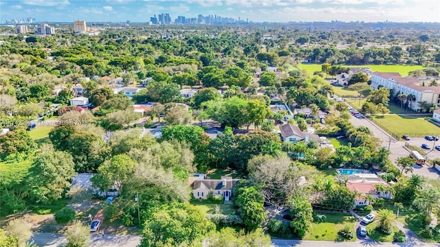 birds eye view of property featuring a city view