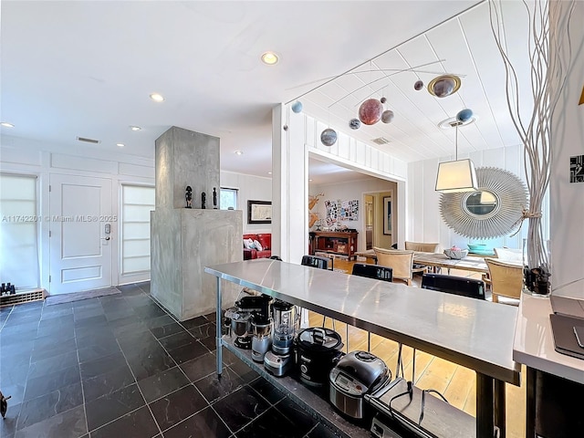 kitchen with visible vents, recessed lighting, and decorative light fixtures