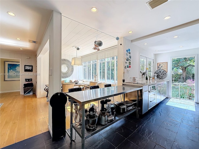 kitchen with sink and pendant lighting