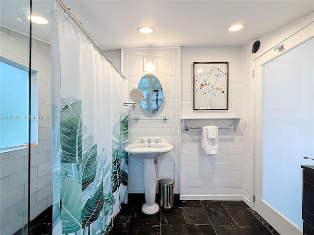 bathroom with a shower with shower curtain