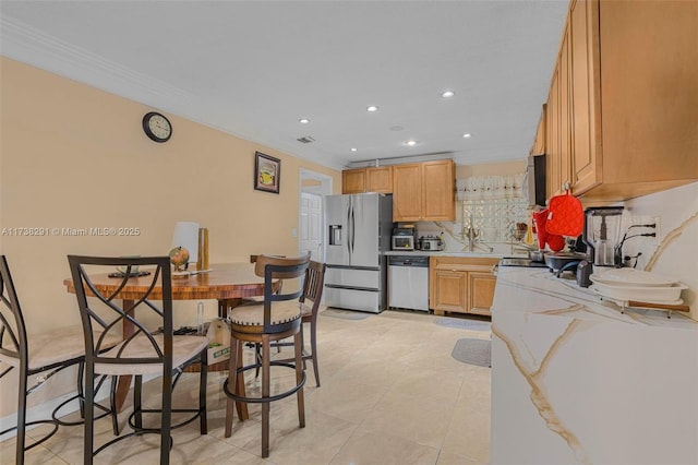 kitchen featuring light stone countertops, appliances with stainless steel finishes, light tile patterned floors, and crown molding