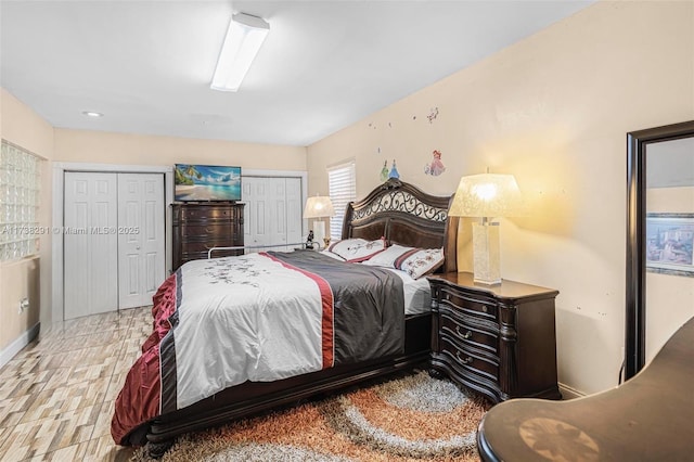 bedroom featuring two closets