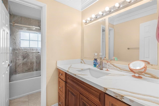 bathroom with tile patterned flooring, bath / shower combo with glass door, vanity, and crown molding