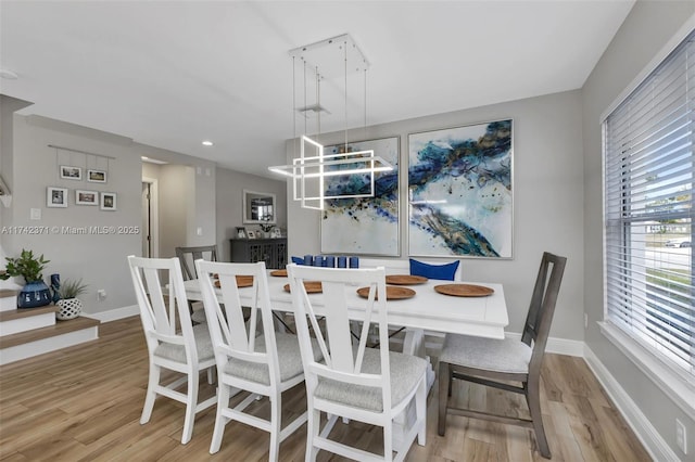 dining room with light hardwood / wood-style floors