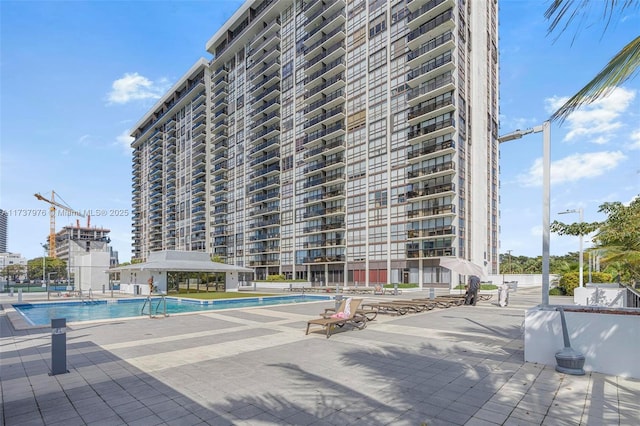 view of swimming pool featuring a patio