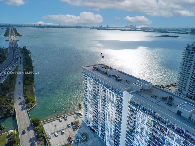 birds eye view of property featuring a water view