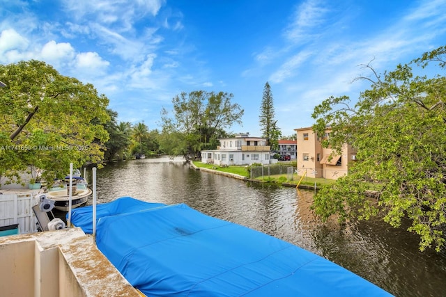 dock area featuring a water view