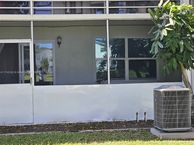 view of home's exterior featuring cooling unit