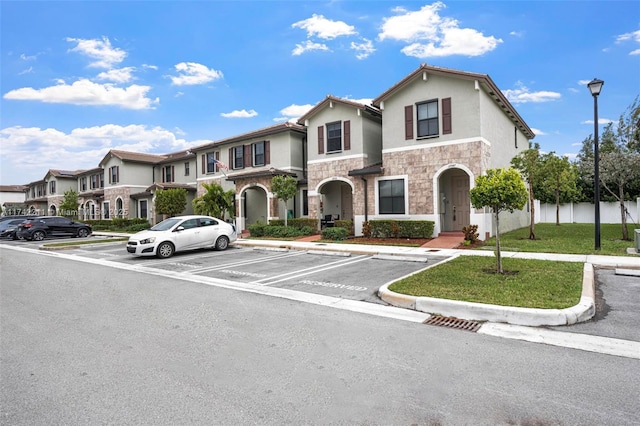 view of front of home with a front lawn