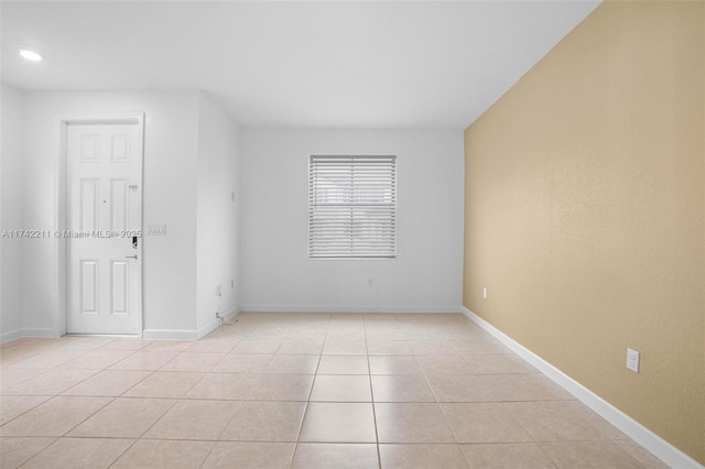 view of tiled spare room