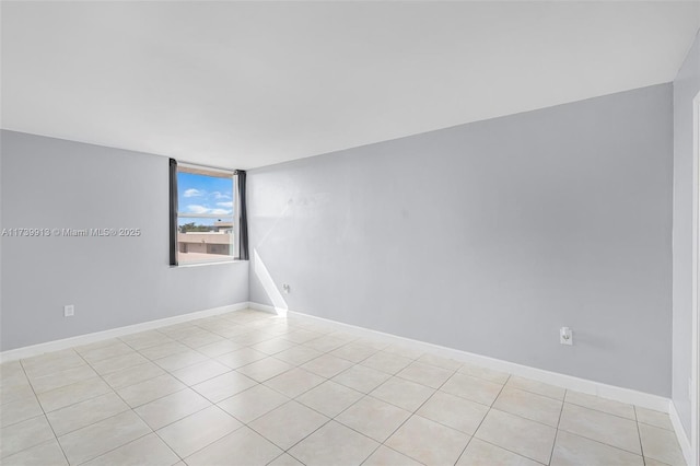 view of tiled spare room