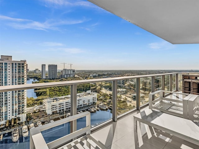 balcony featuring a water view