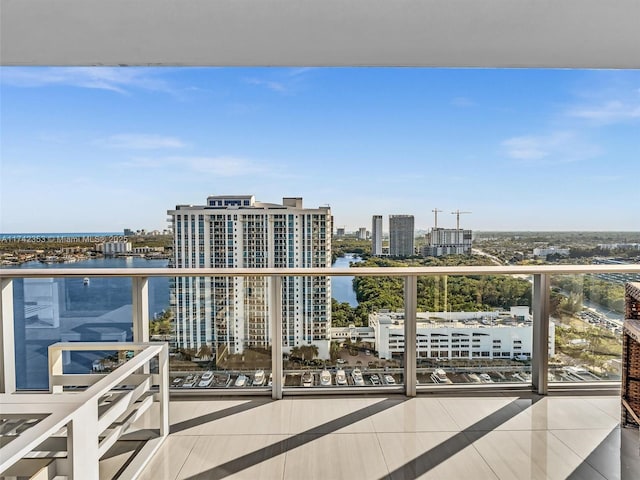 balcony featuring a water view