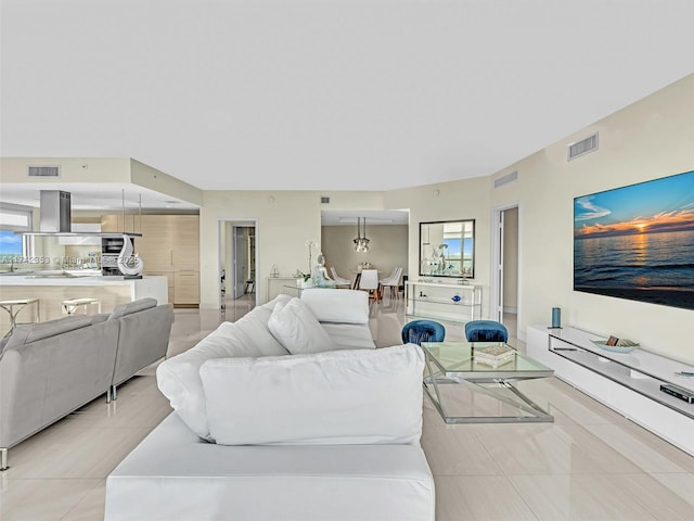 living room featuring light tile patterned floors